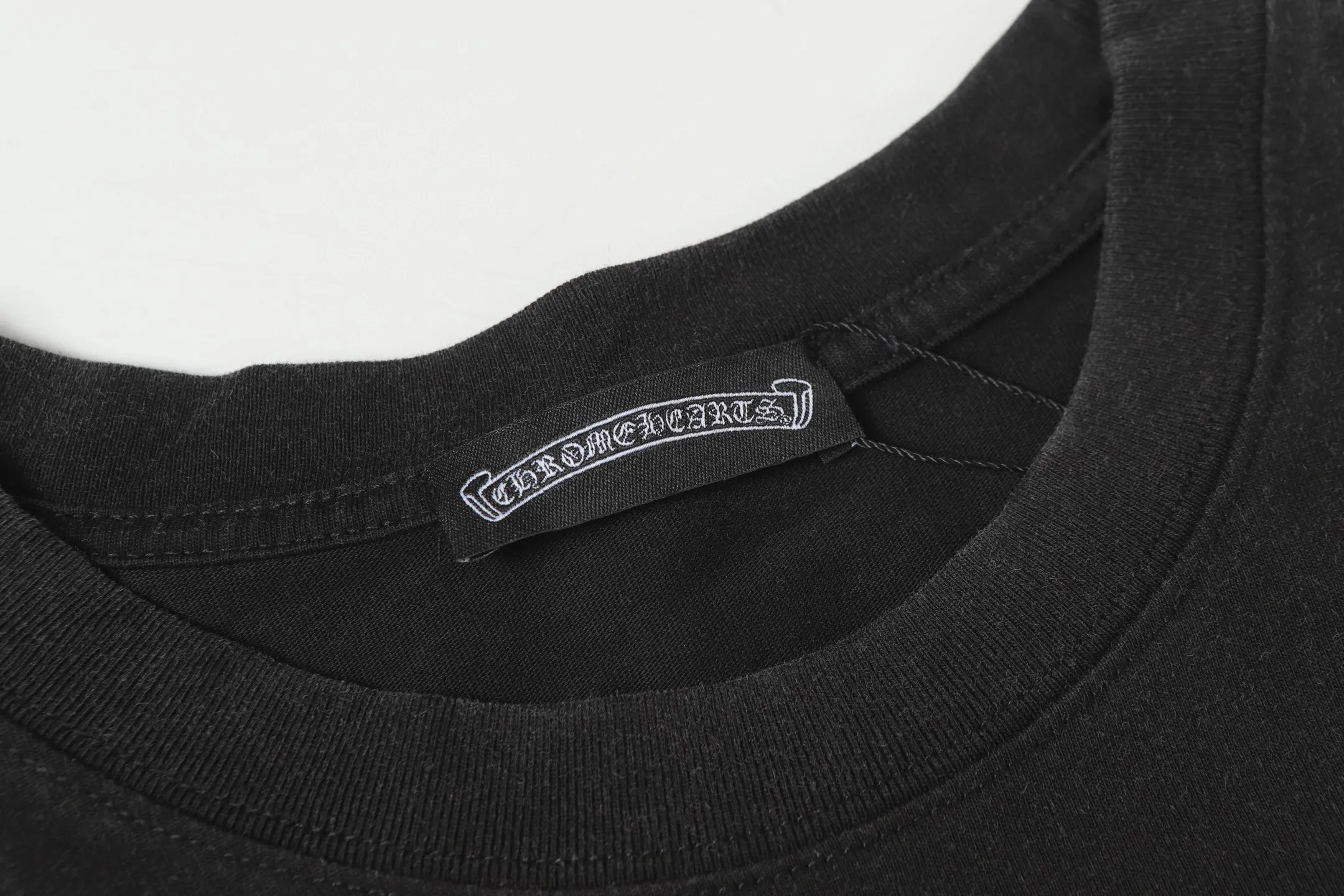🅿️180 Chrome hearte/Chrome heart ch 25ss early spring new Sanskrit logo washed T-shirt short sleeves. A must-have item for daily commuting for men and women in light luxury. The correct version is welcome to compare. Detailed features ·280g 100% cotton double yarn jersey fabric ·Special thickened 32 pieces of double-strand 1x1 thread in the same vat ·Double-needle cross-stitch technology ·Original main mark washed hangtag COLOUR: Washed black SIZE：xs-l